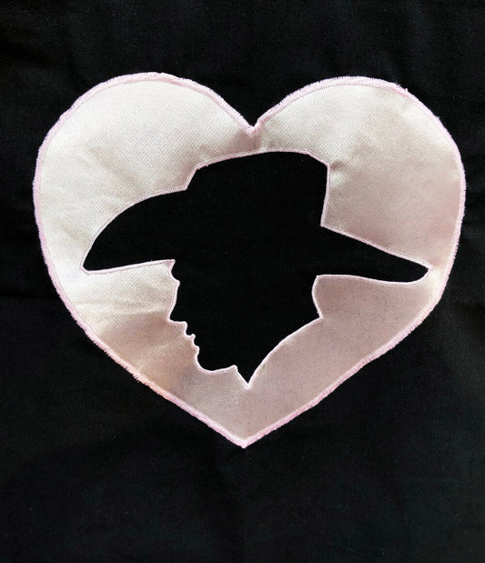Embroidered cowboy in pink satin on black tote